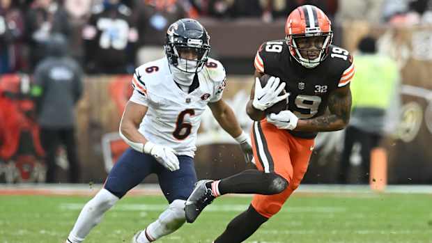 Dec 17, 2023; Cleveland, Ohio, USA; Cleveland Browns wide receiver Cedric Tillman (19) runs with the ball after a catch as Chicago Bears cornerback Kyler Gordon (6) defends during the second half at Cleveland Browns Stadium.